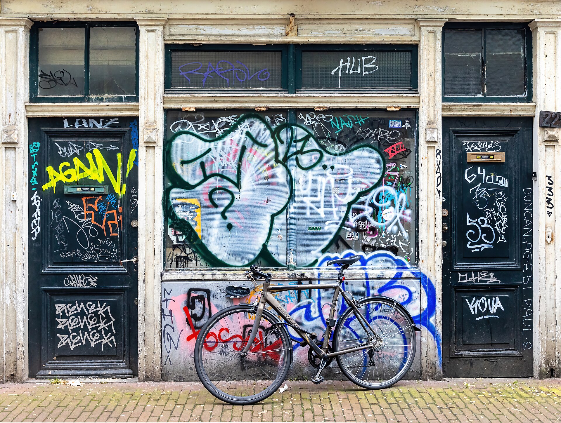 Bicycles parked along an Amsterdam canal.